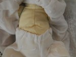 porcelain baby doll white gown bottom